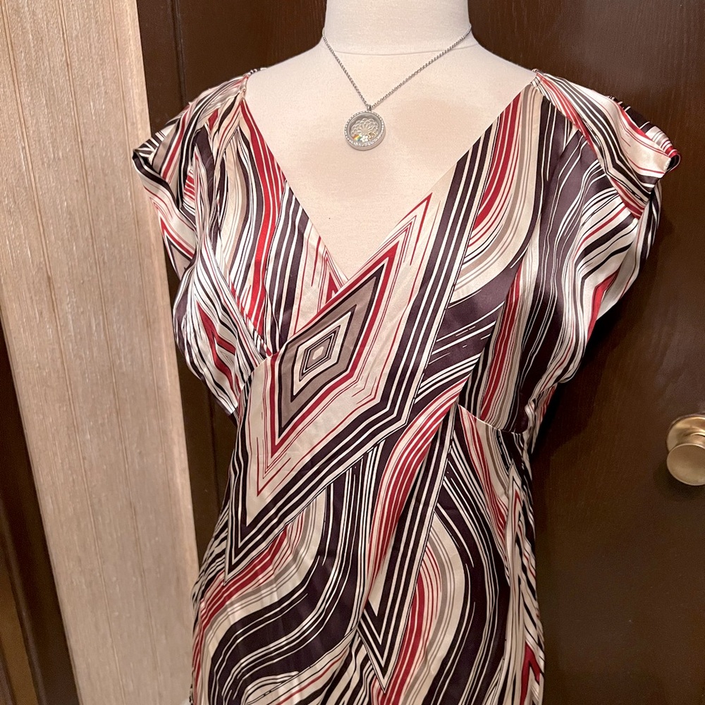 Beautiful Top for Summer or Fall and can be paired with a sweater for winter.